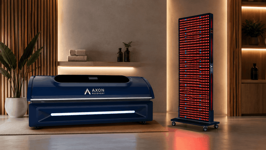 Axon Recovery red light therapy bed and panel equipment in a wellness room